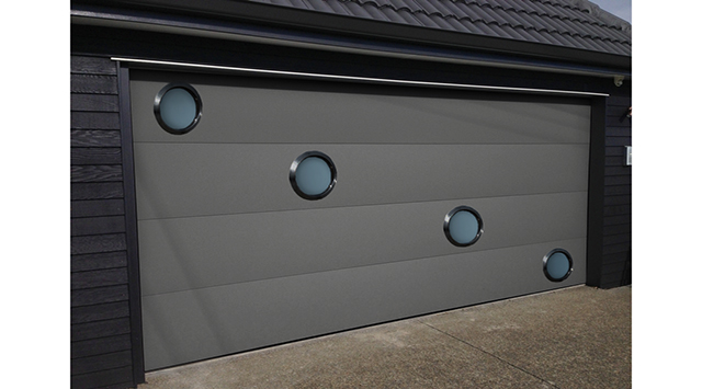 Porte de garage sectionnelle avec hublots ronds